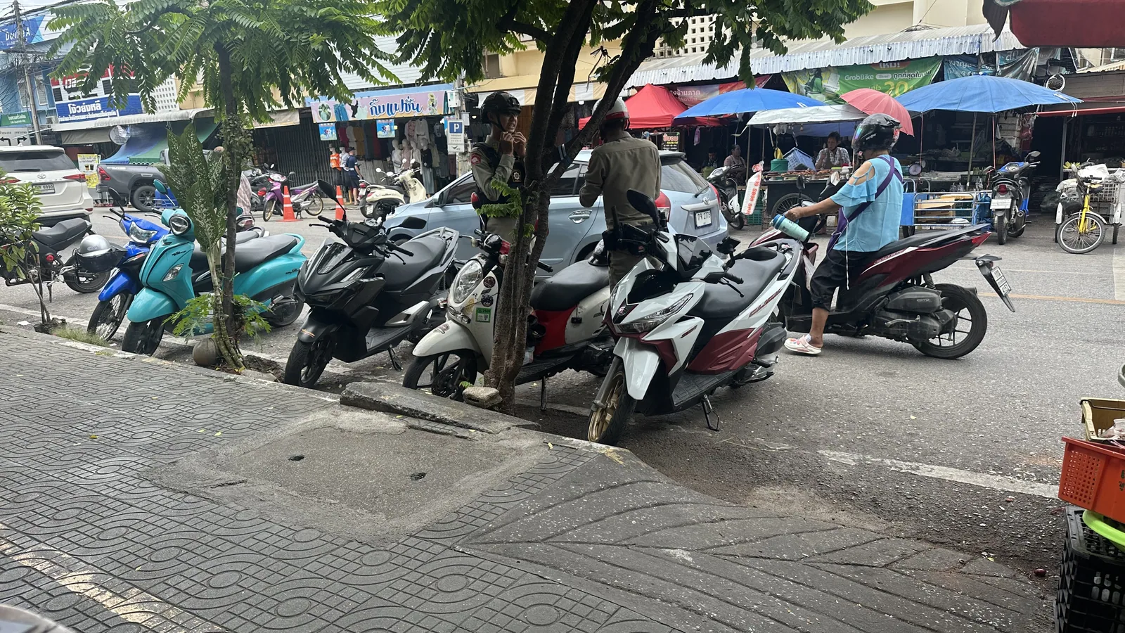 Scooters parked at the market