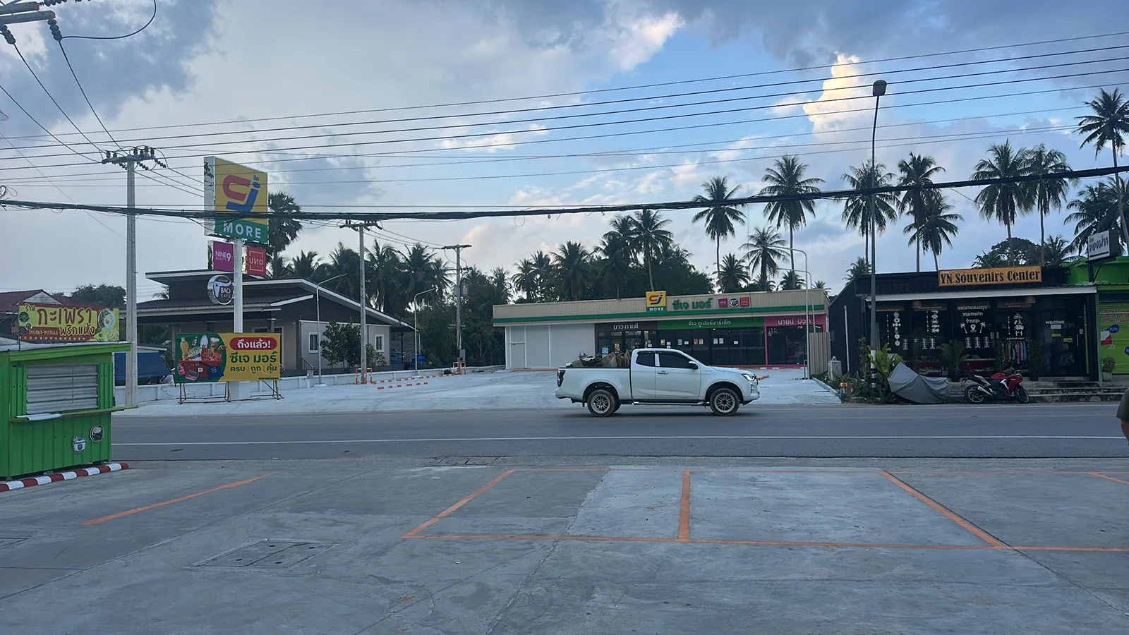 Minibus and shops on the highway