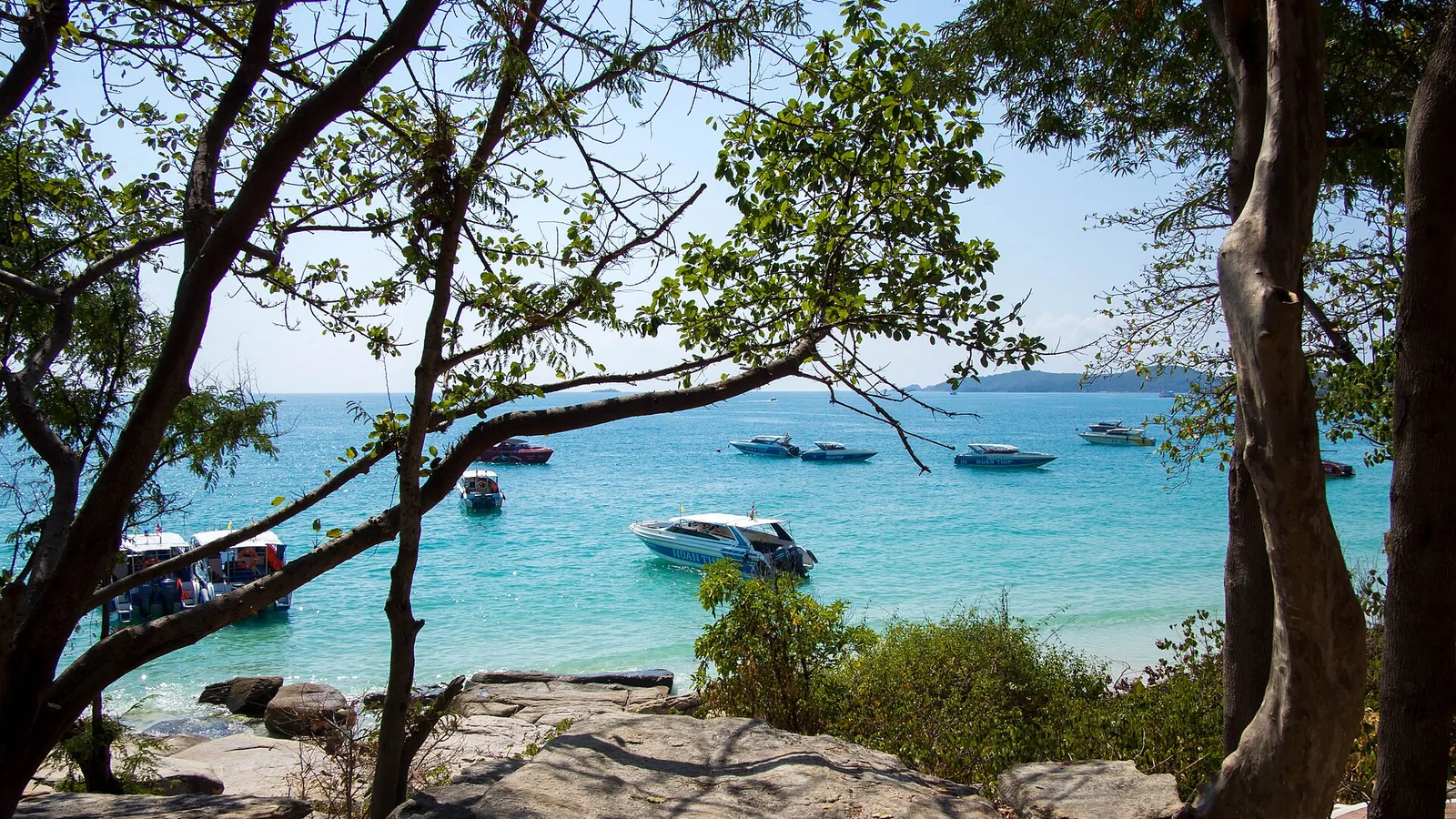 Rocky shoreline and clear water on Koh Samet